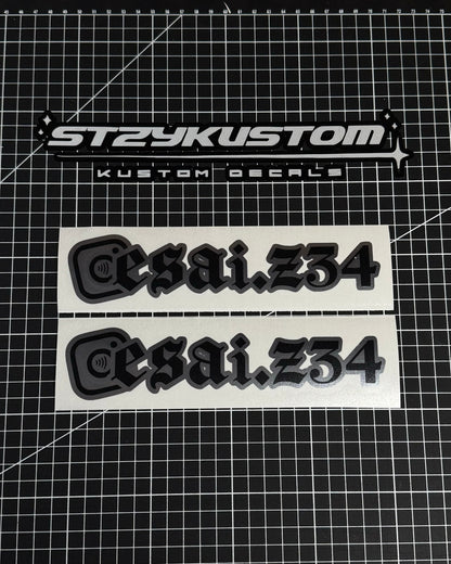 Two 'esai.234' decals on a grid background with 'STZYKUSTOM' branding.